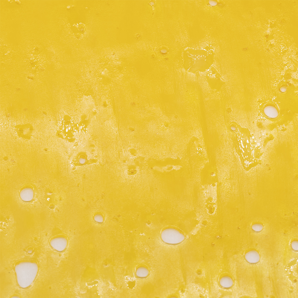 buy-weed-online-dispensary-west-coast-releaf-concentrates-shatter-mango-fruz-crop Shatter - Mango Fruz - Indica - Image 1